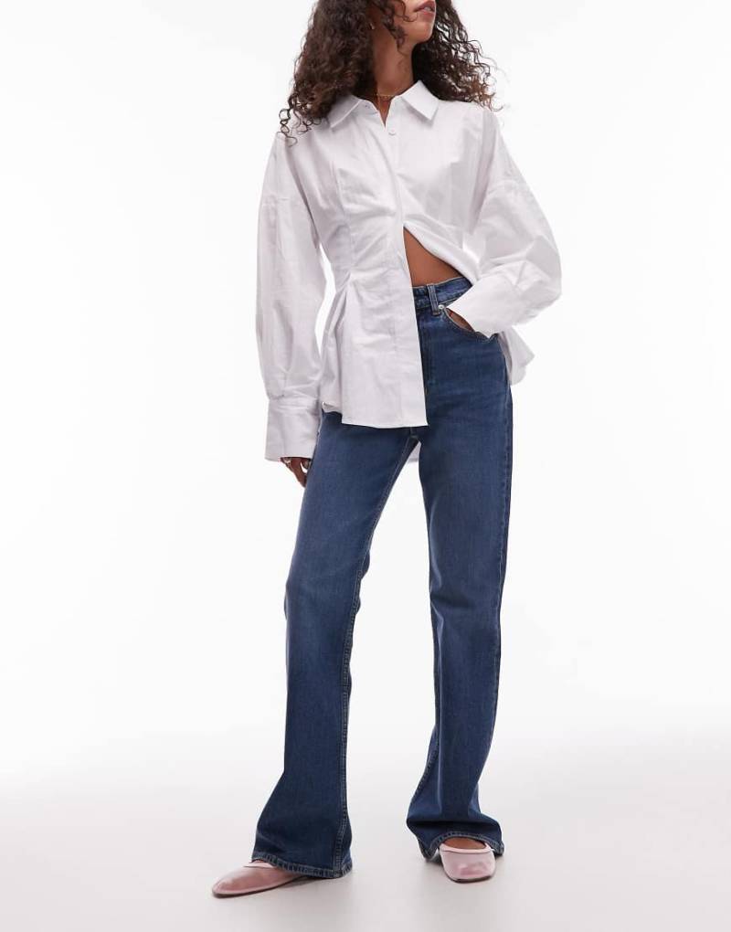 ARKET - Rain - Ausgestellte Jeans in mittelblauer Waschung mit schmalem Schnitt von Arket