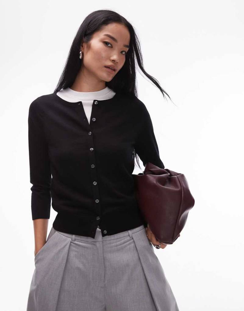 ARKET - Strickjacke aus Merinowolle in Schwarz ARKET - Strickjacke aus Merinowolle in Schwarz von Arket