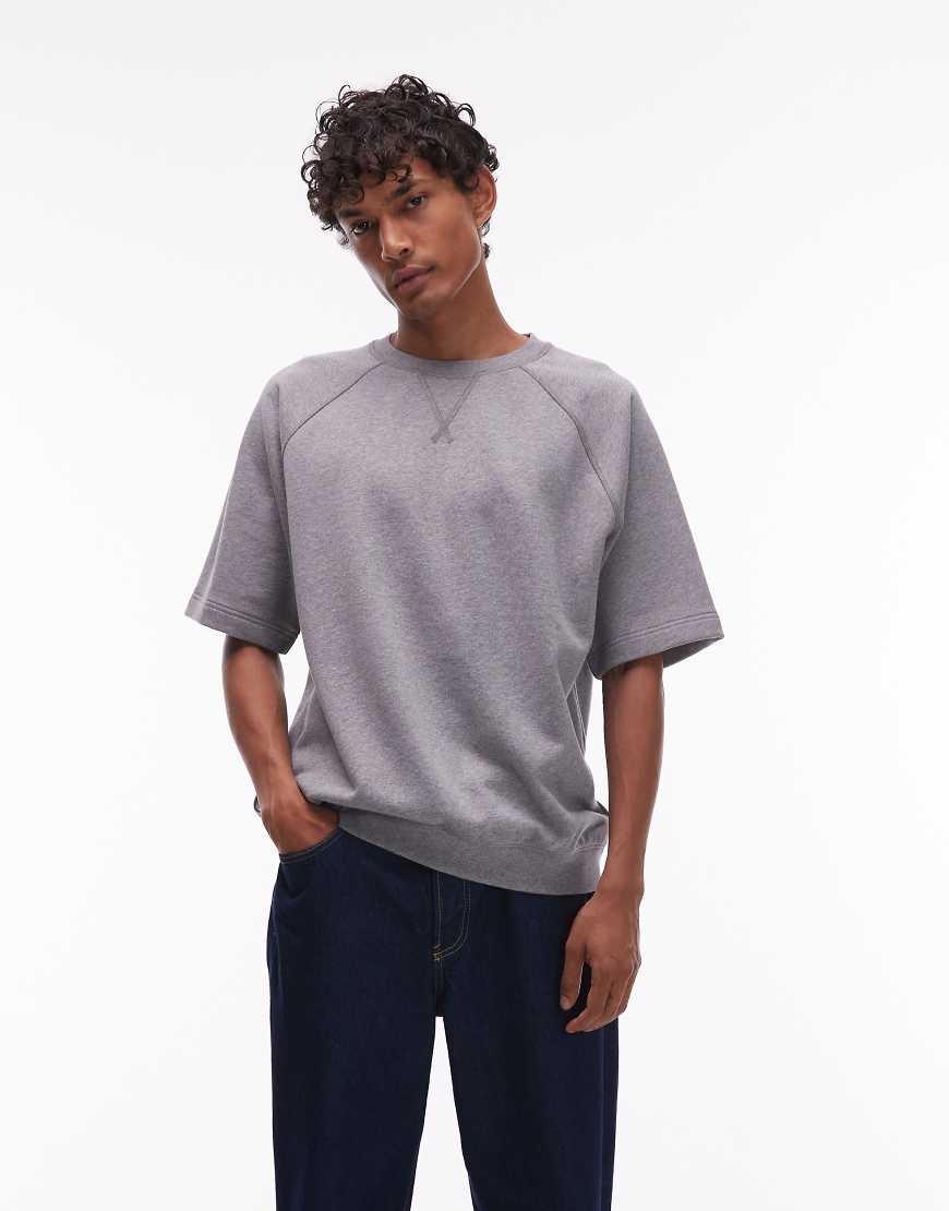 ARKET - Sweatshirt aus Jersey-Loopback in meliertem Grau mit kurzen Raglanärmeln ARKET - Sweatshirt aus Jersey-Loopback in meliertem Grau mit kurzen Raglanärmeln von Arket