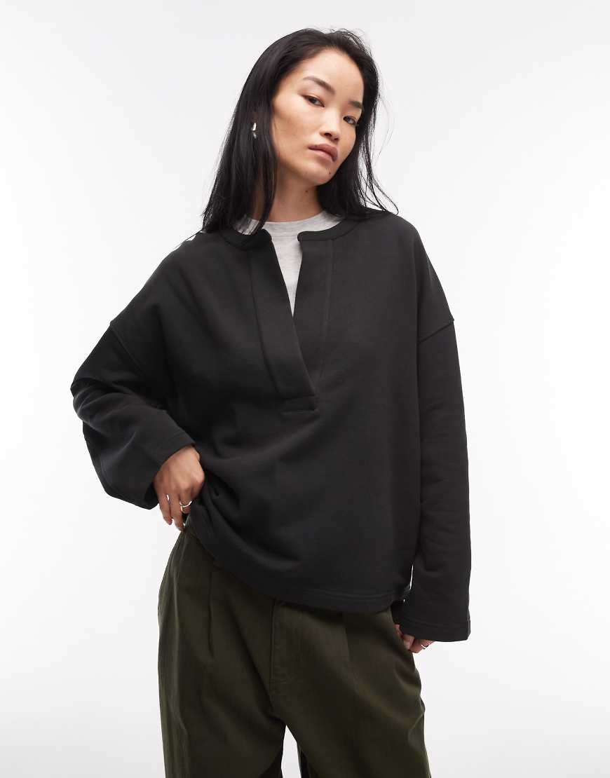 ARKET - Sweatshirt aus reiner Baumwolle in Schwarz mit V-Ausschnitt von Arket