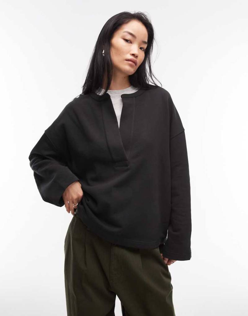 ARKET - Sweatshirt aus reiner Baumwolle in Schwarz mit V-Ausschnitt von Arket