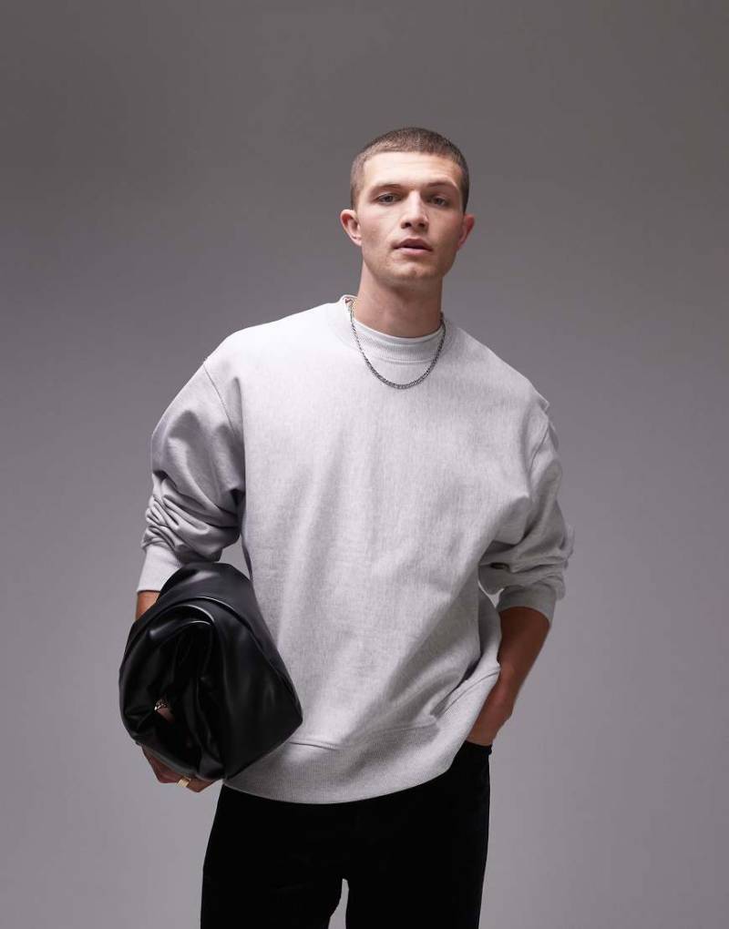 Weekday - Locker geschnittenes Sweatshirt aus schwerem Material in Hellgrau meliert mit seitlichen Einsätzen von Arket