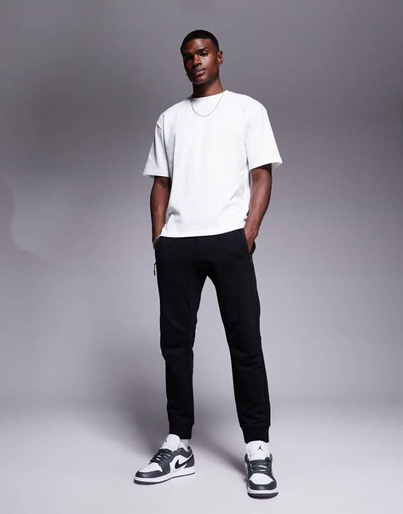 Armani Exchange - Jogginghose in Schwarz mit Logobündchen von Armani Exchange