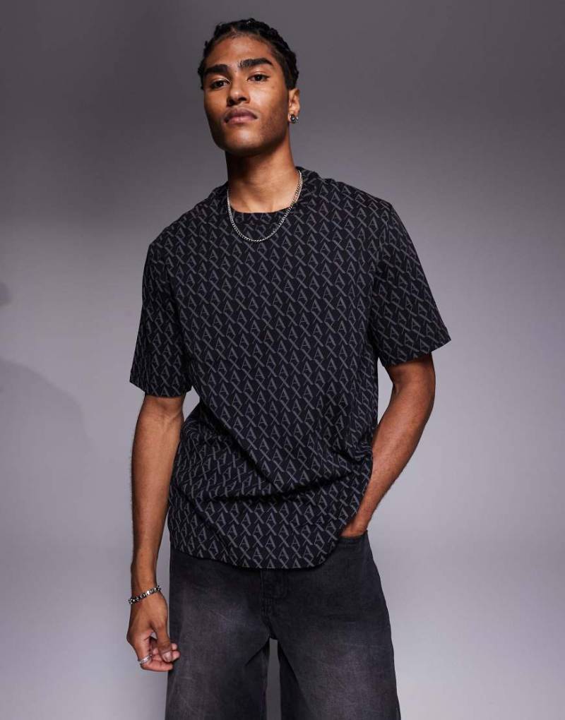Armani Exchange - Kurzärmliges T-Shirt in Schwarz mit All-over-Logo von Armani Exchange
