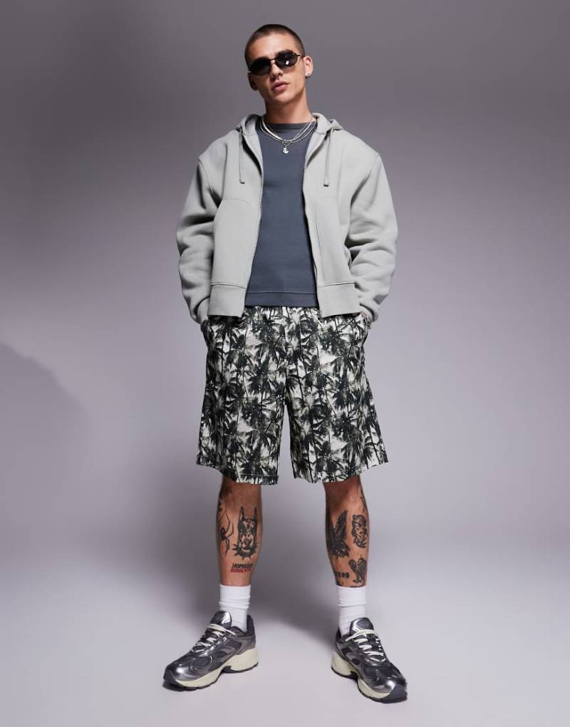 Armani Exchange - Shorts in Grün mit Palmenmuster von Armani Exchange