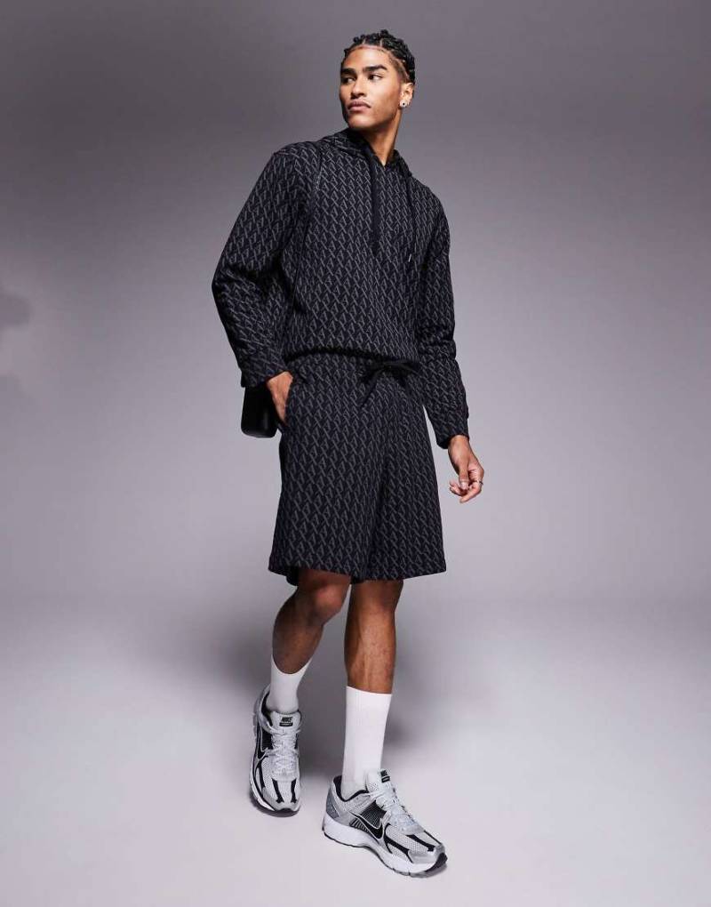 Armani Exchange - Shorts in Schwarz mit Logomuster, Kombiteil von Armani Exchange