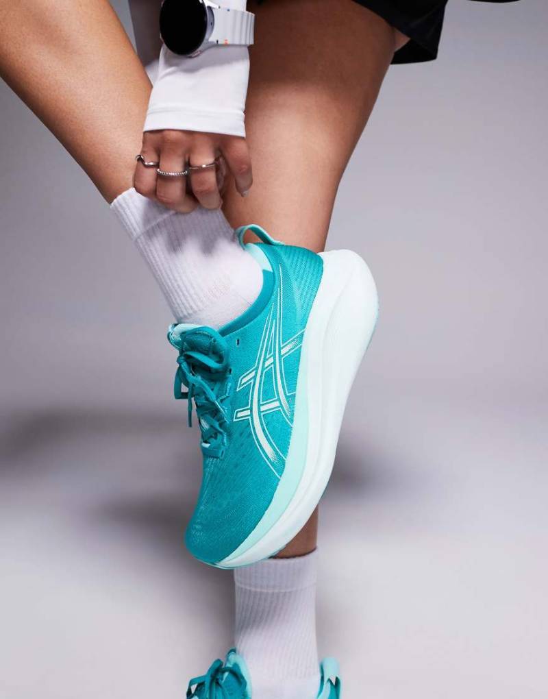 Asics - Gel-Nimbus 27 - Lauf-Sneaker in Petrol und Illuminate-Mint mit Wellendetail-Blau von Asics