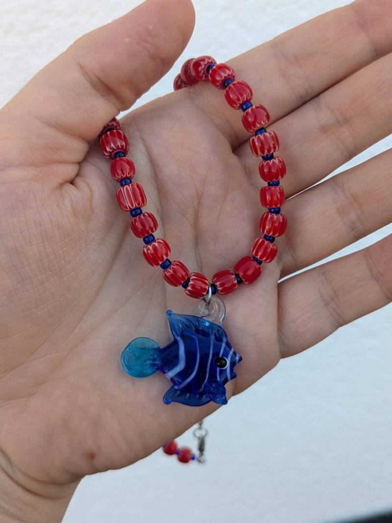 Coralia - Red Glass Beaded Necklace With Blue Fish Charm Ocean-Inspired Statement Jewelry Handmade Jewellery Coralia - Red Glass Beaded Necklace With Blue Fish Charm Ocean-Inspired Statement Jewelry Handmade Jewellery von AtelierLuanle