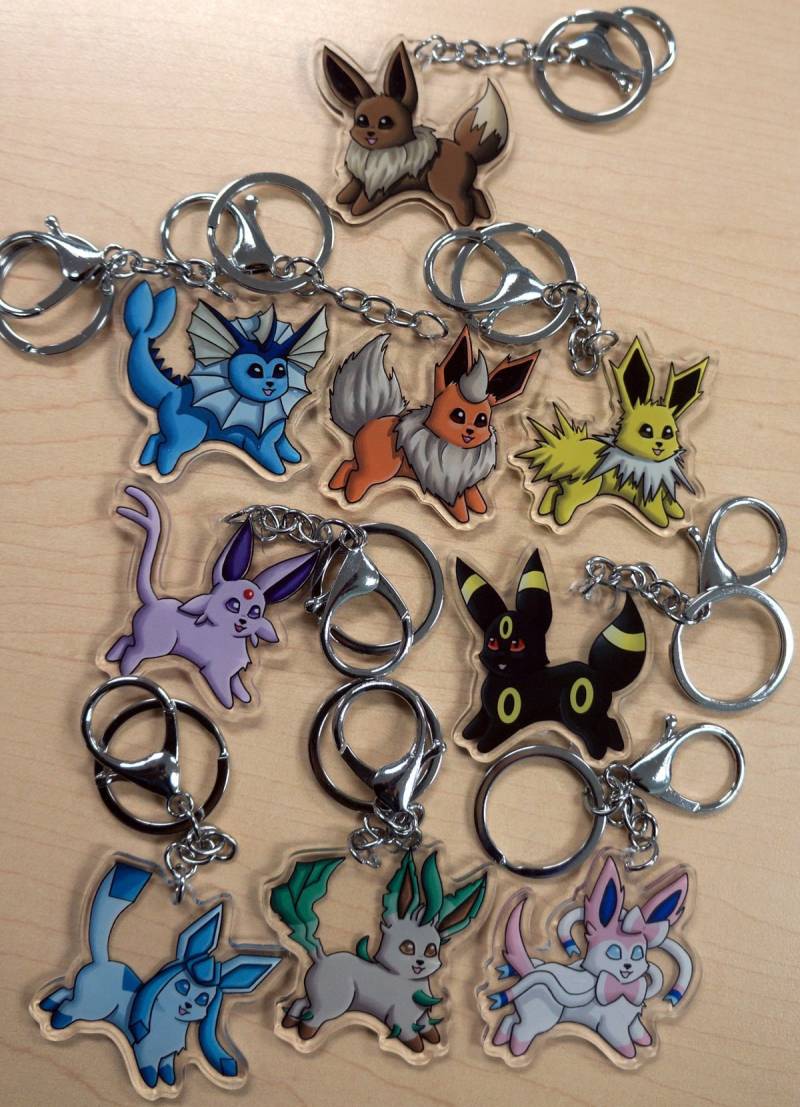 Niedliche Eeveelution Doppelseitige Schlüsselanhänger Oder 65cm Halskette - Eevee, Jolteon, Flareon Vaporeon, Espeon, Umbreon, Glaceon, Leafeon von AutumnColour