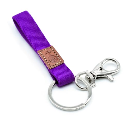 BDM Originaler Schlüsselanhänger aus violettem Stoff mit einem Stück Leder, auf dem das Zeichen der Frau eingraviert ist. Feministischer Schlüsselanhänger mit Silberring. von BDM
