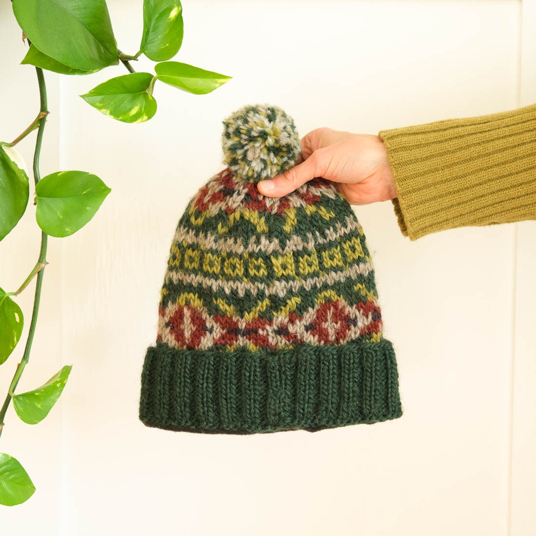 Fair Isle Handgestrickte Wolle Bommelmütze - Trade 100% Fleece Futter Fair Isle Handgestrickte Wolle Bommelmütze - Trade 100% Fleece Futter von BIBICO
