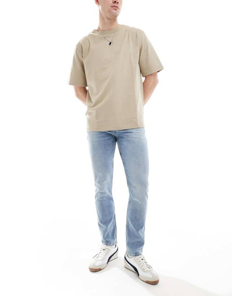 BOSS Orange - Delaware - Schmal geschnittene Jeans in heller Waschung-Blau von BOSS Orange