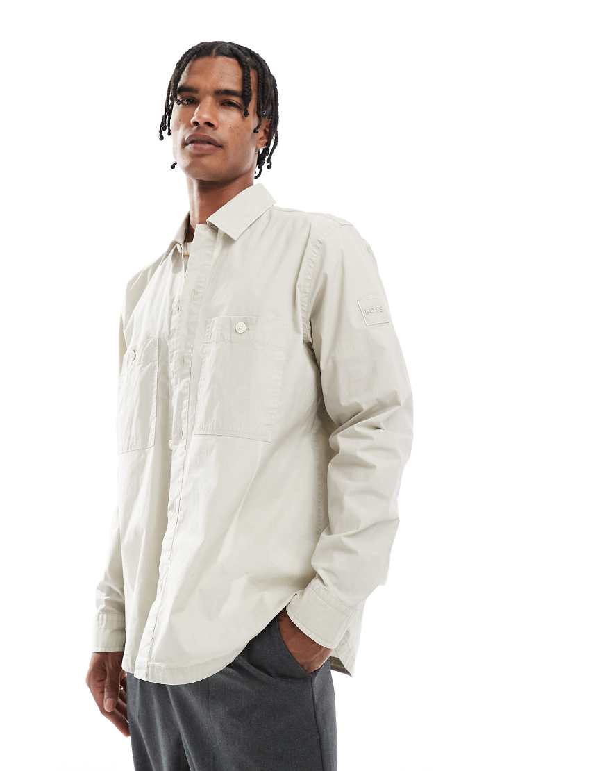 BOSS Orange - Locky_2 - Oversize-Hemdjacke in Beige mit Box-Logo am Ärmel-Neutral BOSS Orange - Locky_2 - Oversize-Hemdjacke in Beige mit Box-Logo am Ärmel-Neutral von BOSS Orange