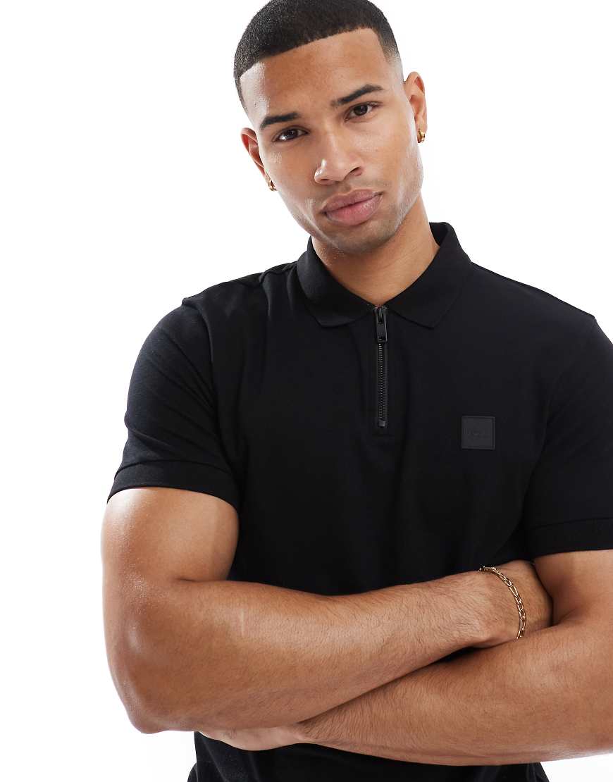 BOSS Orange - Passertip - Schmal geschnittenes Polohemd in Schwarz mit farblich abgestimmtem Logo BOSS Orange - Passertip - Schmal geschnittenes Polohemd in Schwarz mit farblich abgestimmtem Logo von BOSS Orange