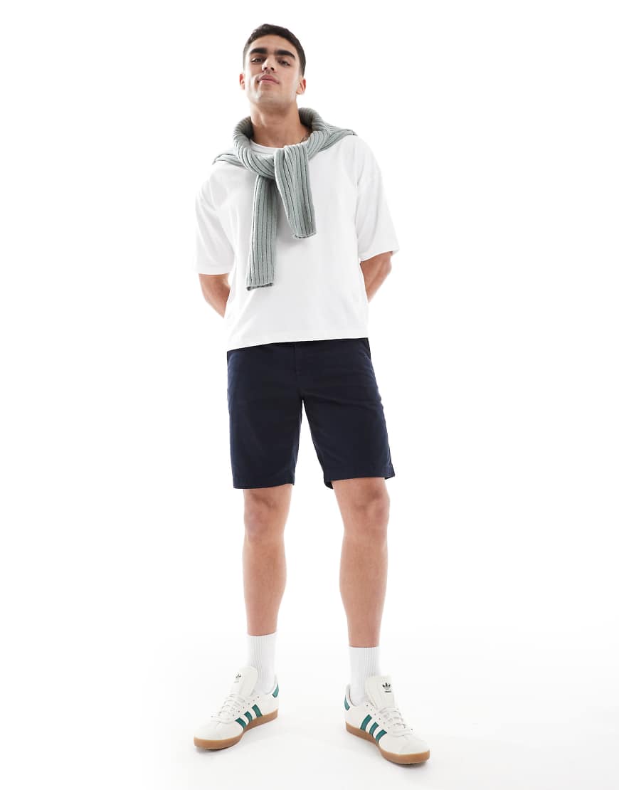 BOSS Orange - Schmal geschnittene Chino-Shorts aus Baumwolle in Marineblau von BOSS Orange