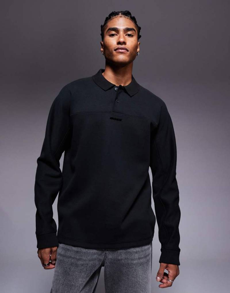 BOSS Orange - Schweres Relaxed-Fit-Polohemd in Schwarz mit mittigem Logo von BOSS Orange