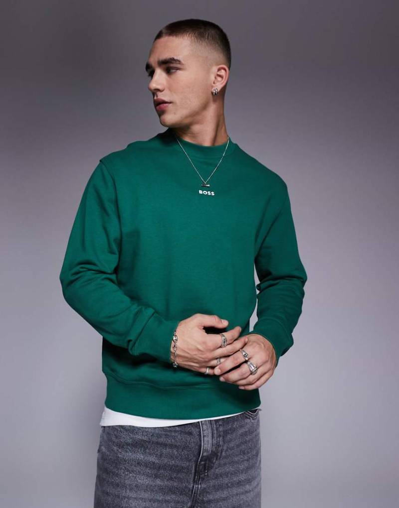 BOSS Orange - WeSmallcrew - Locker geschnittenes Sweatshirt in Mittelgrün mit mittigem Logo von BOSS Orange