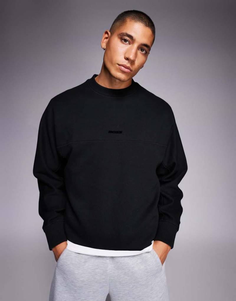 Boss Orange - Schweres Relaxed Fit Sweatshirt in Schwarz mit mittigem Logo von BOSS Orange