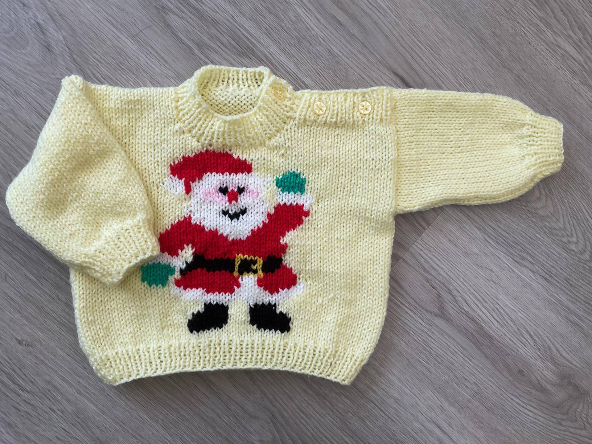 Hand Gestrickter Weihnachtlicher Baby Pullover in Blau Mit Santa. 6-12 Monate Hand Gestrickter Weihnachtlicher Baby Pullover in Blau Mit Santa. 6-12 Monate von BabyKnittingByIsabel
