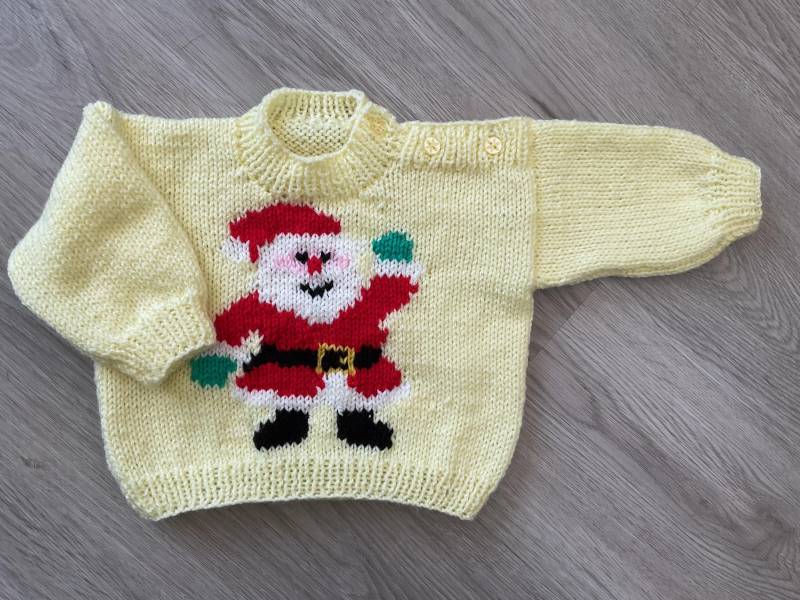 Hand Gestrickter Weihnachtlicher Baby Pullover in Blau Mit Santa. 6-12 Monate Hand Gestrickter Weihnachtlicher Baby Pullover in Blau Mit Santa. 6-12 Monate von BabyKnittingByIsabel