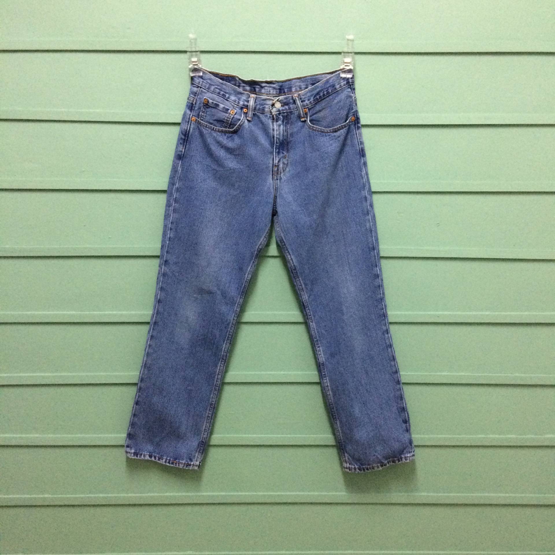 W31 L28 Vintage Distressed Levis 516 Jeans Light Wash Rigid Denim Straight Leg Taille 31 von BackyardFashion