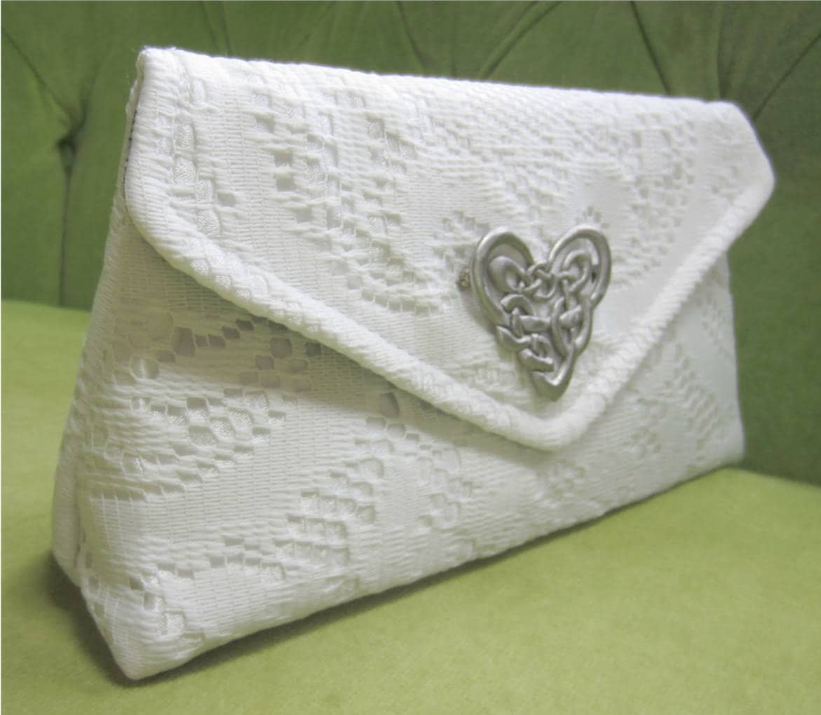 Elfenbeinfarbene Spitzenclutch Elfenbeinfarbene Spitzenclutch von BagsbyPattio