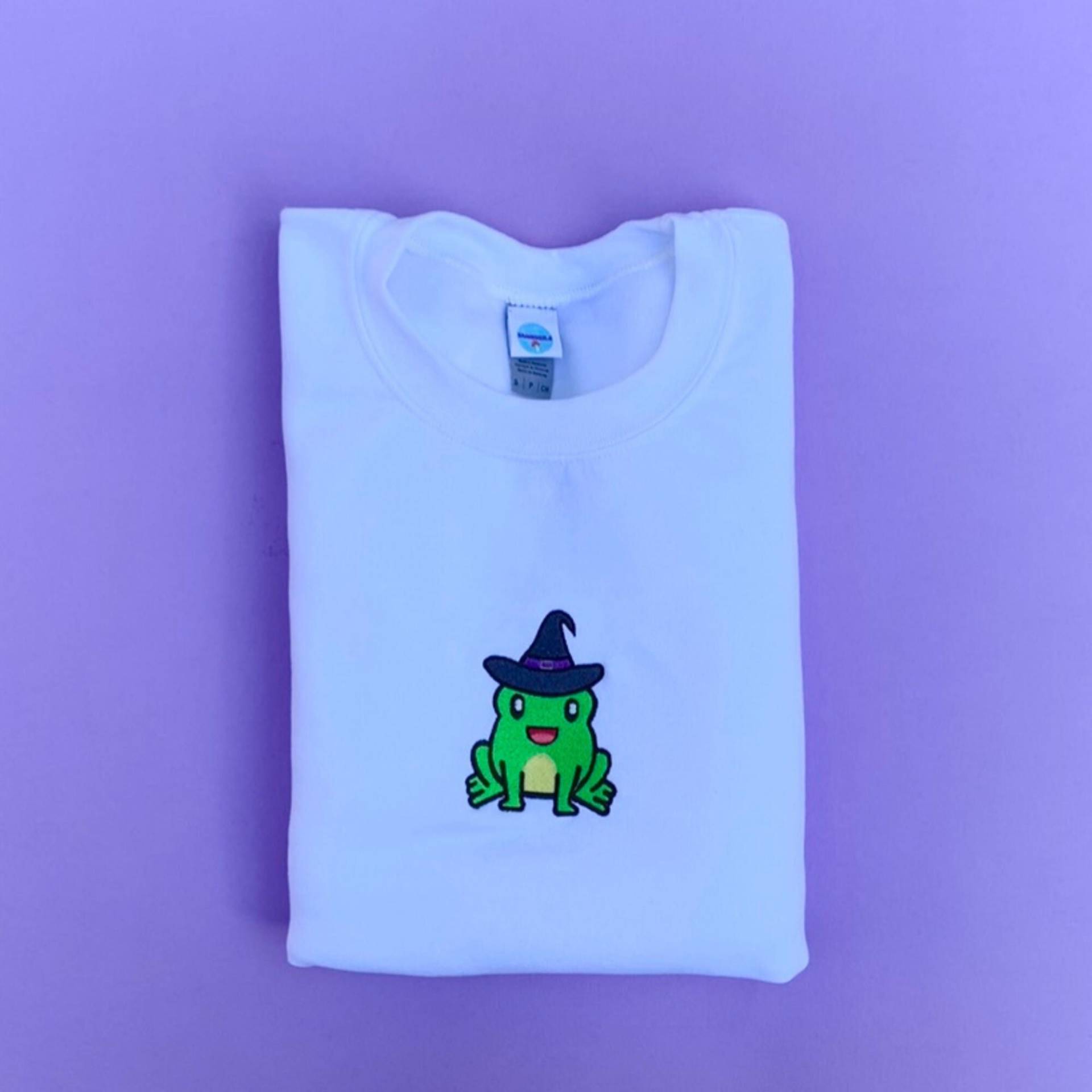Süßer Halloween Frosch Hexe Besticktes Sweatshirt | Stickerei Pullover Süßer Halloween Frosch Hexe Besticktes Sweatshirt | Stickerei Pullover von BamboozleStore