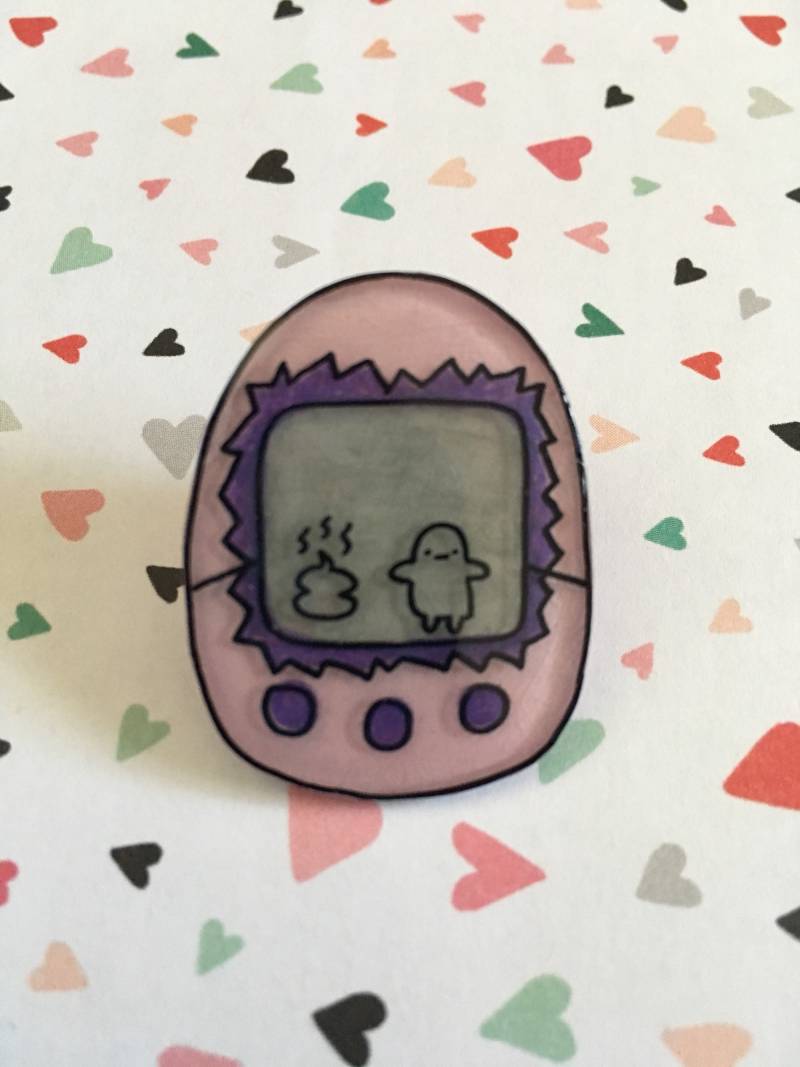 Poo Tamagotchi Pin Poo Tamagotchi Pin von BananaAndBear