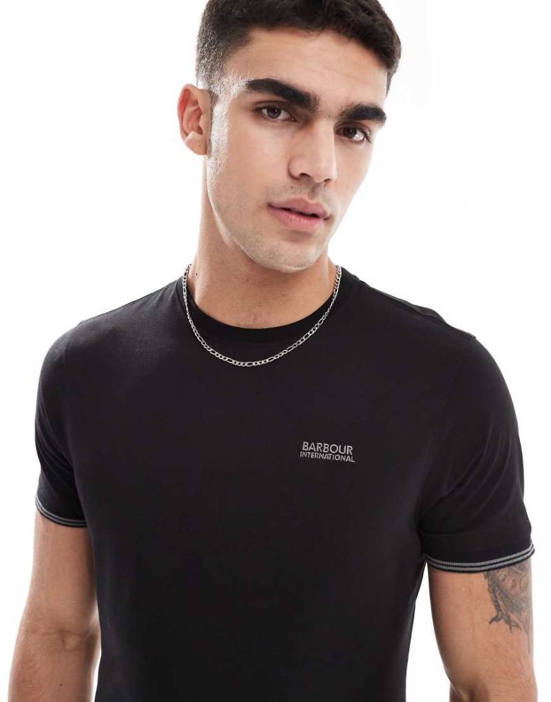 Barbour International - Philio - T-Shirt in Schwarz mit Zierstreifen an den Bündchen Barbour International - Philio - T-Shirt in Schwarz mit Zierstreifen an den Bündchen von Barbour International