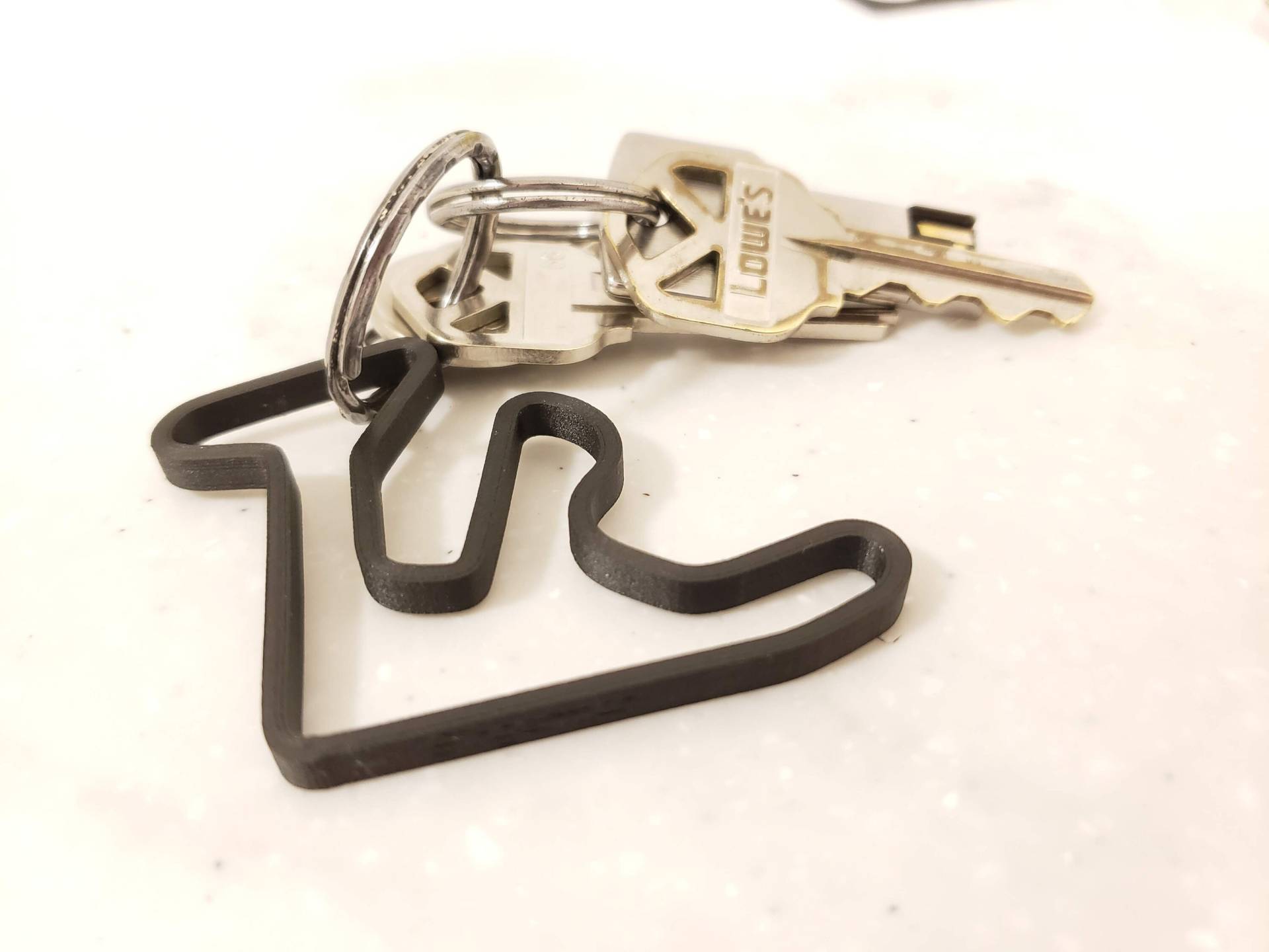 Gingerman Rennbahn Keychain Schlüsselanhänger Gingerman Rennbahn Keychain Schlüsselanhänger von BarefootIndLLC