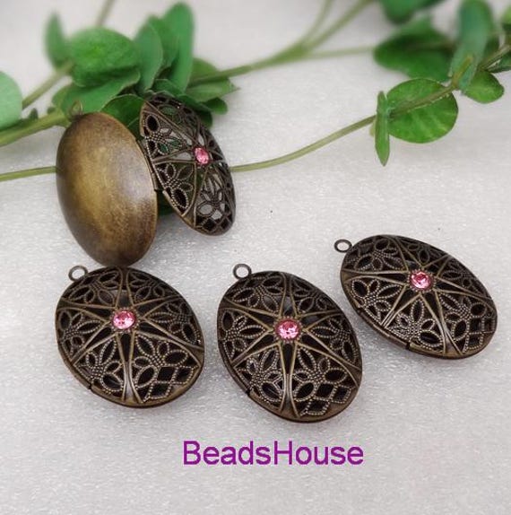4 Stück 25 X 40 Mm Antike Bronze Auf Messing Oval Medaillon Anhänger Mit Swarovski Strass | Rose von BeadsHouse