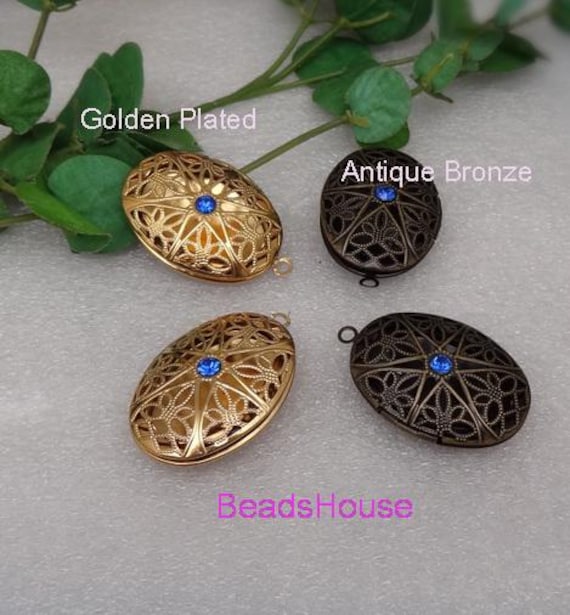 4 Stück | 25 X 40 Mm Vergoldete/Antike Bronze Auf Messing Ovale Medaillons, Mit Swarovski Strasssteinen | Saphir von BeadsHouse