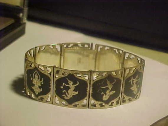Wunderschöne Vintage Sterlingsilber Signiert Siam 9 Panel Große Klobige Breit Tänzerin Armband 41 Gramm Wunderschöne Vintage Sterlingsilber Signiert Siam 9 Panel Große Klobige Breit Tänzerin Armband 41 Gramm von BellarosaUS
