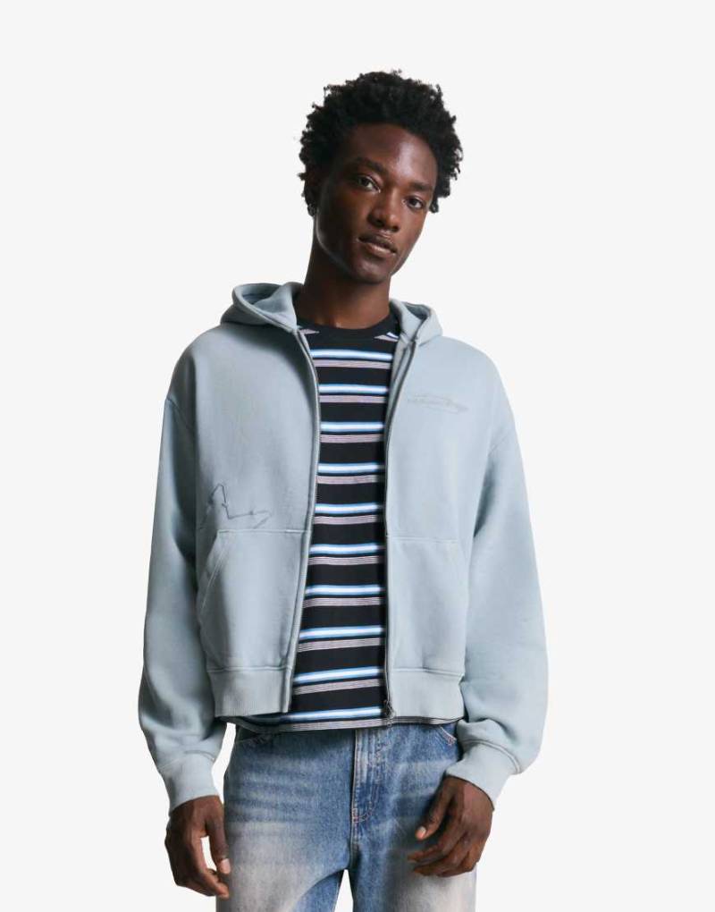 Bershka - Cropped-Sweatshirt in Hellblau mit Reißverschluss und Stickerei von Bershka