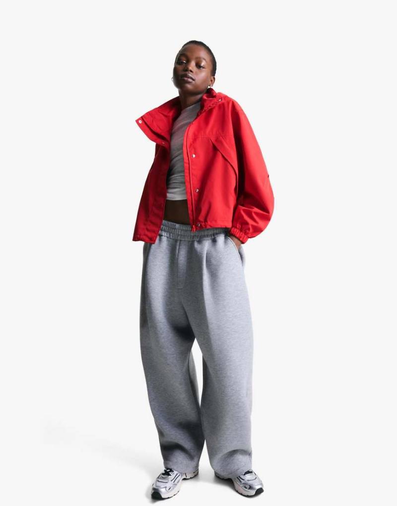 Bershka - Funktionsjacke in Rot mit Kapuze von Bershka