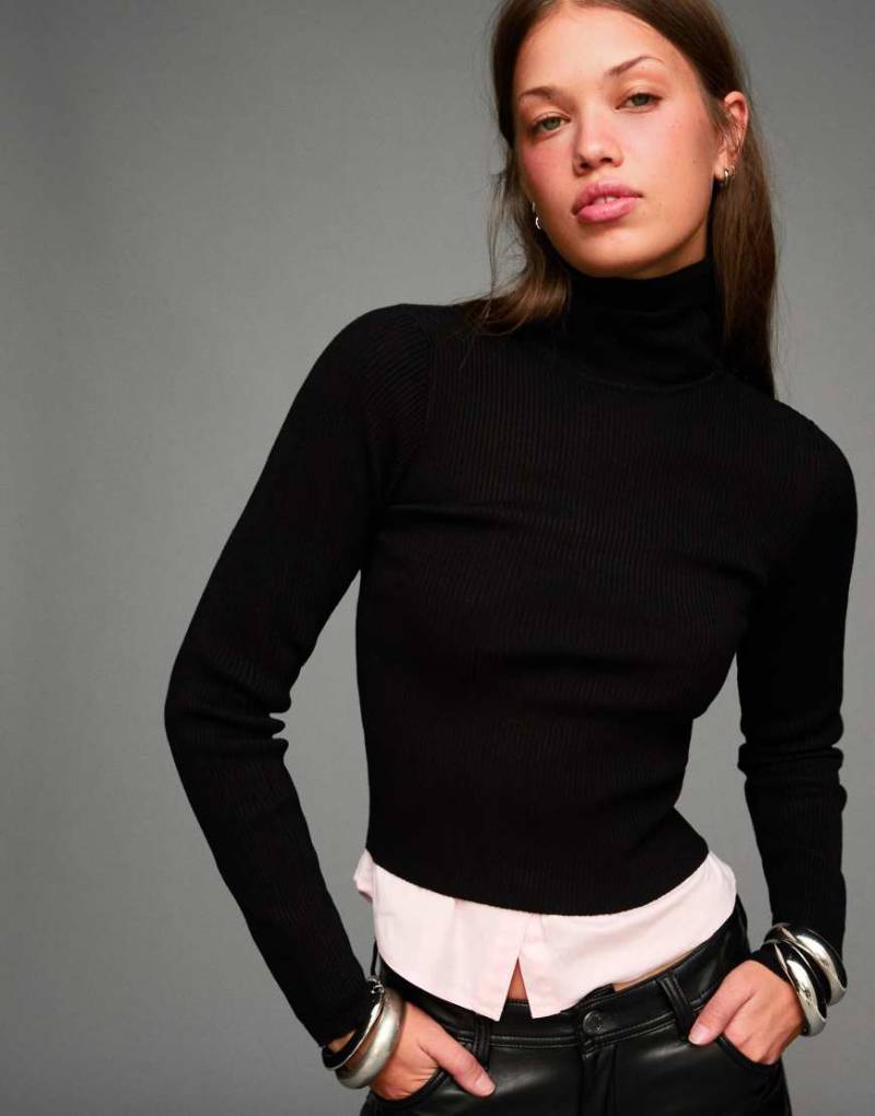 Bershka - Gerippter Pullover in Schwarz mit hohem Kragen Bershka - Gerippter Pullover in Schwarz mit hohem Kragen von Bershka