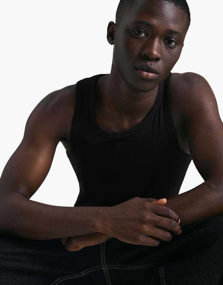 Bershka - Geripptes Trägershirt in Schwarz von Bershka