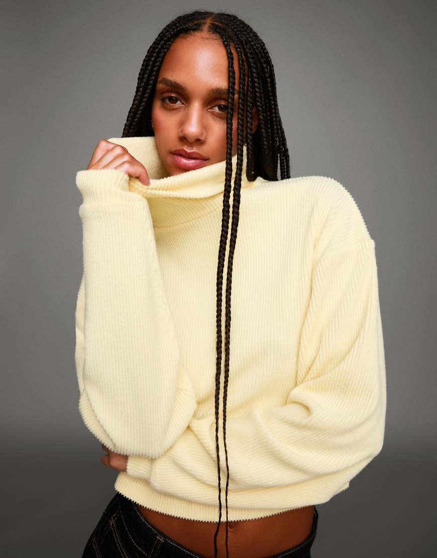 Bershka - Hochgeschlossener, gerippter Pullover in Gelb Bershka - Hochgeschlossener, gerippter Pullover in Gelb von Bershka