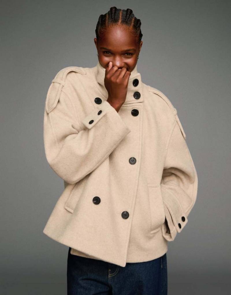 Bershka - Jacke in Ecru mit Filzstruktur und Trichterkragen-Weiß Bershka - Jacke in Ecru mit Filzstruktur und Trichterkragen-Weiß von Bershka