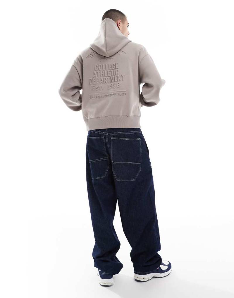 Bershka - Kapuzenpullover in Beige mit Prägeprint-Neutral Bershka - Kapuzenpullover in Beige mit Prägeprint-Neutral von Bershka