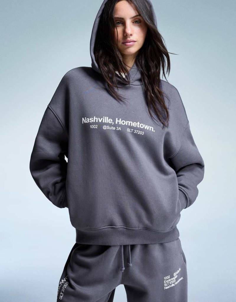 Bershka - Kapuzenpullover in Grau mit Print-Neutral von Bershka