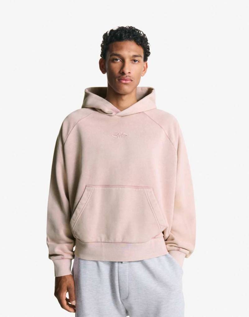 Bershka - Kastiger Kapuzenpullover in verwaschenem Rosa von Bershka