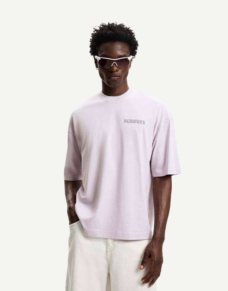 Bershka - Kurzärmliges Oversize-T-Shirt in Flieder mit Print-Lila Bershka - Kurzärmliges Oversize-T-Shirt in Flieder mit Print-Lila von Bershka