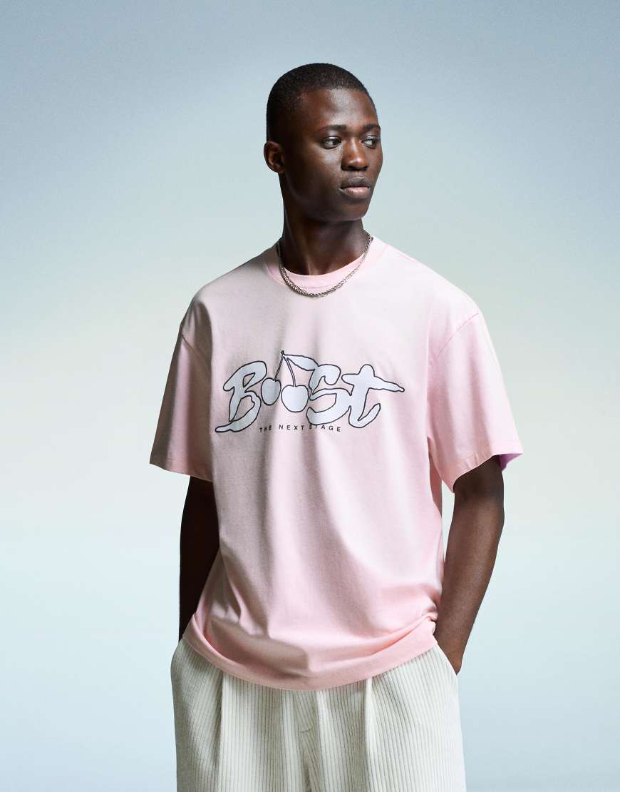 Bershka - Kurzärmliges T-Shirt in Rosa mit Print von Bershka