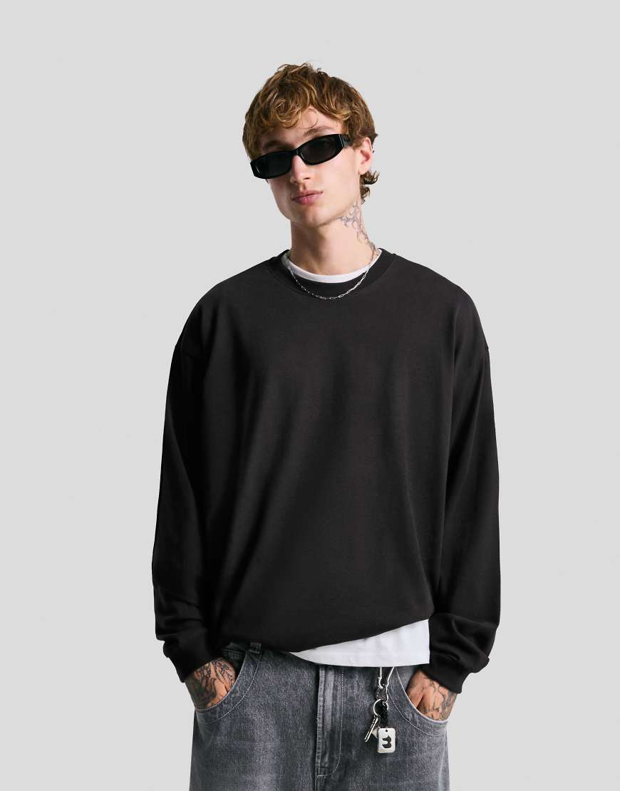 Bershka - Langärmliges, kastiges T-Shirt in Schwarz von Bershka