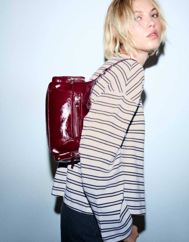 Bershka - Langärmliges T-Shirt in Ecru mit Print-Weiß von Bershka