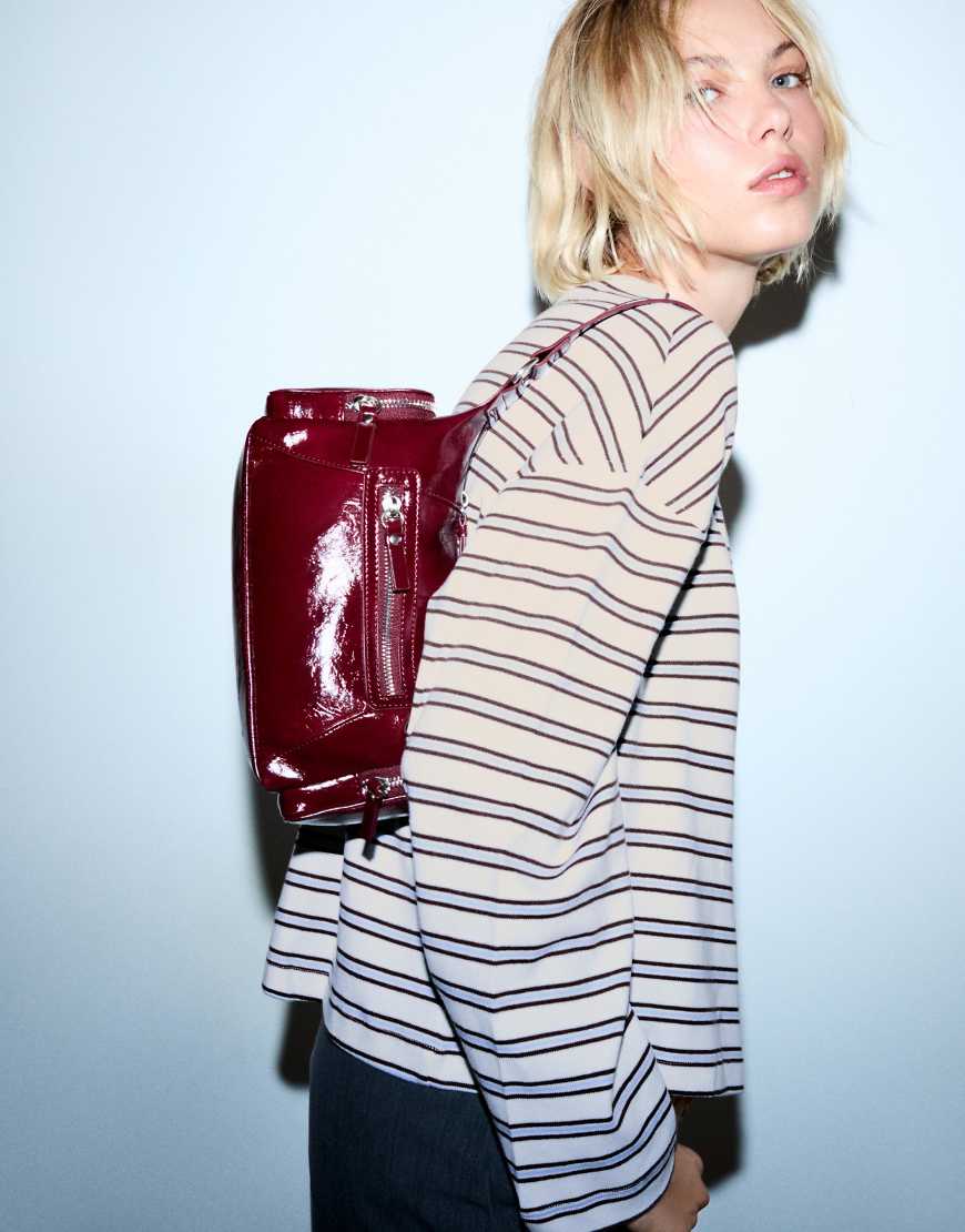 Bershka - Langärmliges T-Shirt in Ecru mit Print-Weiß von Bershka