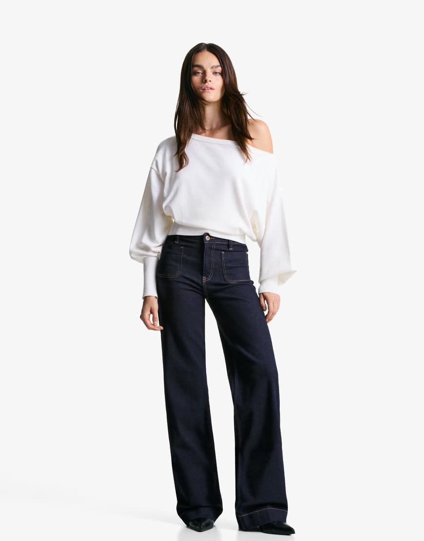 Bershka - Nahtlose Jeans in Marineblau mit weitem Bein und Taschen von Bershka