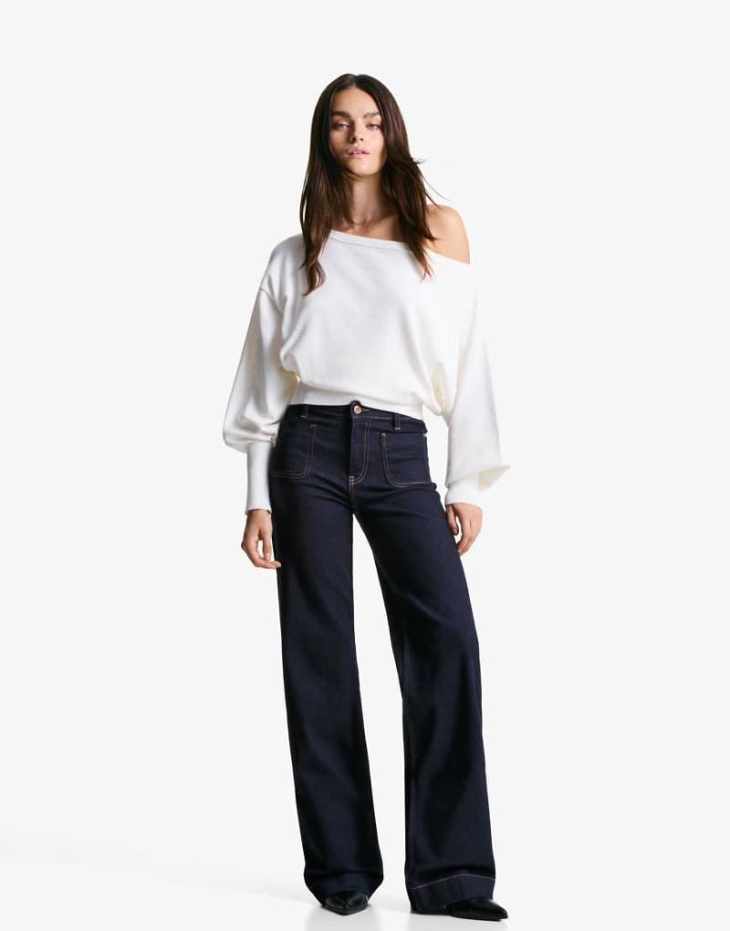 Bershka - Nahtlose Jeans in Marineblau mit weitem Bein und Taschen von Bershka