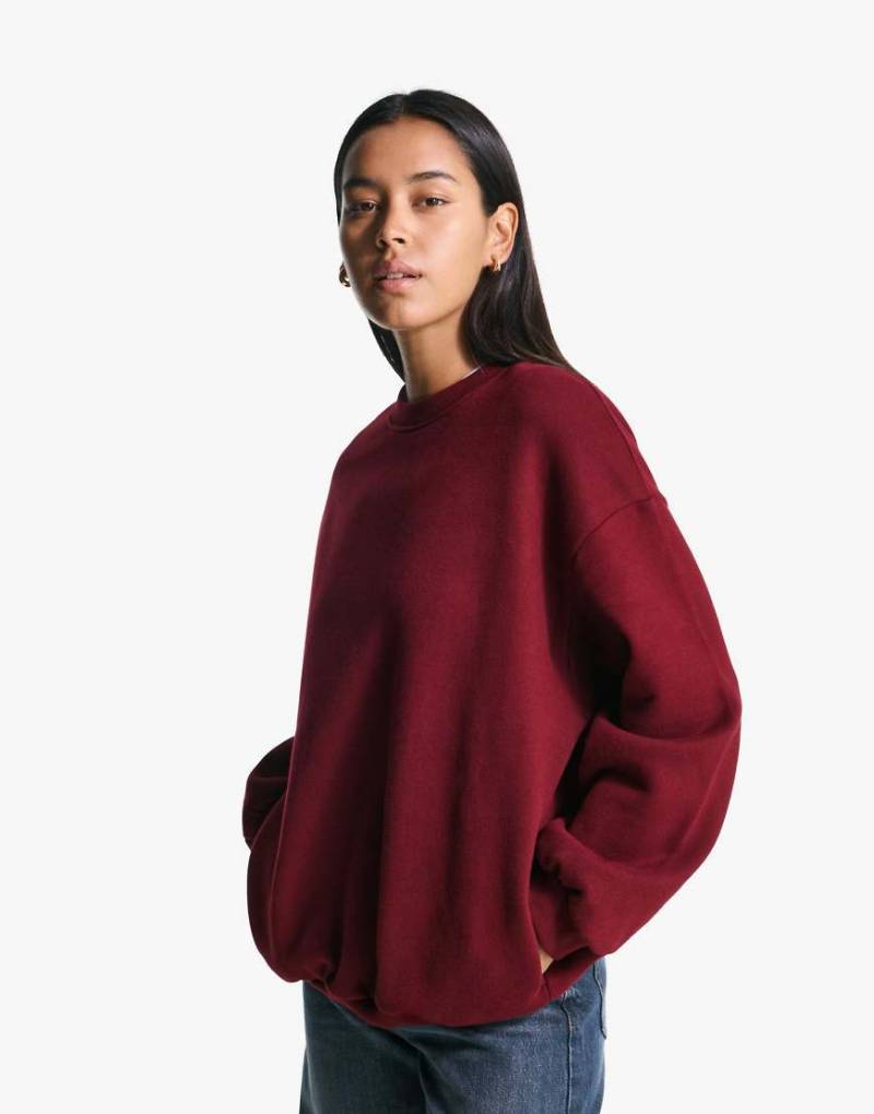 Bershka - Oversize-Sweatshirt in Burgunderrot mit Taschen von Bershka